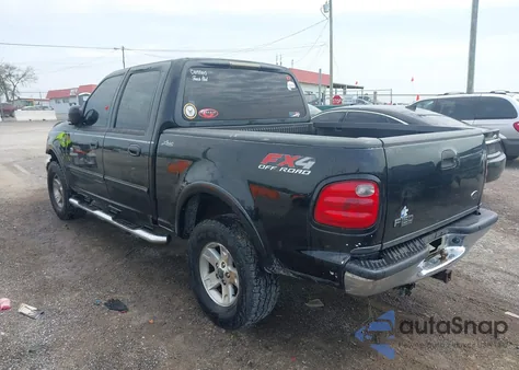 2002 Ford F-150 Lariat/Xlt z USA, uszkodzony, nr VIN 1FTRW08L72KD27457